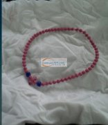 义乌青口有大量编织（纽扣结 ）产品外发 如图