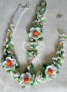 如图，寻会做这款米珠饰品加工厂