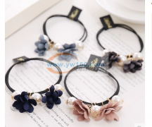 北苑贸易公司有多款皮筋布艺头饰外发 如图