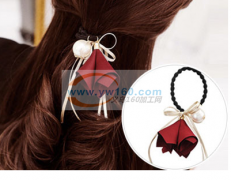 北苑贸易公司有多款皮筋布艺头饰外发 如图