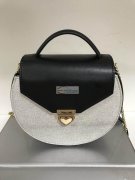 承接各类女包加工，真皮包单色100个起订，PU和牛津布300