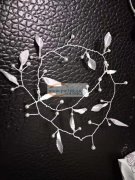 手工拧的，胶枪打的头带，外发加工