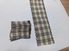 能将上面的布条打成这种卷的形状的加工厂联系