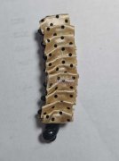 能将上面的布条打成这种卷的形状的加工厂联系