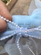 找李集拷边拷珍珠的加工厂