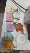 卡通彩色耳机迷你零钱包，6万个处理价1.</strong>